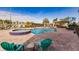 Relaxing pool and spa with covered patio and seating at 1349 Aqui Esta Dr # 125, Punta Gorda, FL 33950