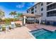 Community spa and patio with seating area at 1349 Aqui Esta Dr # 125, Punta Gorda, FL 33950