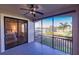 Private screened balcony with bedroom access and water views at 1349 Aqui Esta Dr # 125, Punta Gorda, FL 33950