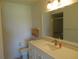 Clean bathroom with a large vanity and shower at 1360 Rio De Janeiro Ave # 117, Punta Gorda, FL 33983