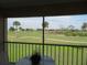 Screened balcony overlooking the golf course at 1360 Rio De Janeiro Ave # 117, Punta Gorda, FL 33983