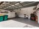Garage with epoxy flooring, ample storage, and shelving at 14009 Black Beauty Dr # 212, Punta Gorda, FL 33955
