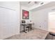 Home office with standing desk, storage, and comfortable seating at 14009 Black Beauty Dr # 212, Punta Gorda, FL 33955