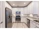 Modern kitchen with stainless steel appliances and granite countertops at 14009 Black Beauty Dr # 212, Punta Gorda, FL 33955