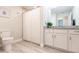 Bathroom boasts granite vanity, white cabinets, and a shower/tub combo at 14009 Black Beauty Dr # 212, Punta Gorda, FL 33955