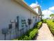 Exterior view of building with multiple electrical meters at 14009 Black Beauty Dr # 212, Punta Gorda, FL 33955