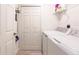 Convenient laundry room with washer, dryer, and extra storage at 14009 Black Beauty Dr # 212, Punta Gorda, FL 33955