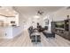Open living area with hardwood floors and modern furniture at 14009 Black Beauty Dr # 212, Punta Gorda, FL 33955