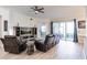 Spacious living room with leather recliners and large TV at 14009 Black Beauty Dr # 212, Punta Gorda, FL 33955