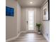 Bright entryway with tile floors and glass-paned door at 14009 Black Beauty Dr # 212, Punta Gorda, FL 33955