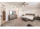 Bright bedroom with king bed, dresser, and ample closet space at 14009 Black Beauty Dr # 212, Punta Gorda, FL 33955