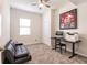 Home office features a workspace, sofa bed, and ample storage at 14009 Black Beauty Dr # 212, Punta Gorda, FL 33955