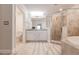 Bathroom with double vanity, walk-in shower, and soaking tub at 14009 Black Beauty Dr # 212, Punta Gorda, FL 33955