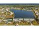 Condos near a lake with surrounding landscape at 1512 Rio De Janeiro Ave # 111, Punta Gorda, FL 33983