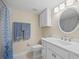 Clean bathroom with white vanity, marble shower, and updated fixtures at 1512 Rio De Janeiro Ave # 111, Punta Gorda, FL 33983