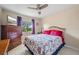 Bright bedroom with double bed, dresser, and view of the backyard at 1512 Rio De Janeiro Ave # 111, Punta Gorda, FL 33983