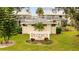 Regency 1512 community sign with lush green lawn at 1512 Rio De Janeiro Ave # 111, Punta Gorda, FL 33983