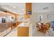 Open concept kitchen with breakfast bar and table at 1512 Rio De Janeiro Ave # 111, Punta Gorda, FL 33983