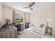 Home office featuring a desk, chair, and comfortable sofa at 1512 Rio De Janeiro Ave # 111, Punta Gorda, FL 33983