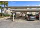 Covered parking space in front of condo building at 1512 Rio De Janeiro Ave # 111, Punta Gorda, FL 33983
