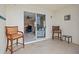 Private patio with comfortable seating, overlooking serene water views at 1512 Rio De Janeiro Ave # 111, Punta Gorda, FL 33983