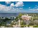 Aerial view of a city with a waterfront, a park with fountain and a municipal building at 1650 W Marion Ave # 144, Punta Gorda, FL 33950