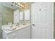 Bathroom with vanity and built-in medicine cabinet at 1650 W Marion Ave # 144, Punta Gorda, FL 33950