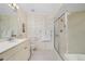 Bathroom with shower, bathtub, and vanity at 1650 W Marion Ave # 144, Punta Gorda, FL 33950