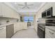 Modern kitchen with stainless steel appliances and water views at 1650 W Marion Ave # 144, Punta Gorda, FL 33950