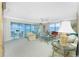 Spacious living room boasts water views and comfortable seating at 1650 W Marion Ave # 144, Punta Gorda, FL 33950