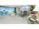 Bright living room showcases water views and comfortable furniture at 1650 W Marion Ave # 144, Punta Gorda, FL 33950