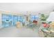 Spacious living room boasts water views and ample natural light at 1650 W Marion Ave # 144, Punta Gorda, FL 33950
