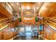 Ornate wooden lobby with stairs, elevator and nautical decorations at 1650 W Marion Ave # 144, Punta Gorda, FL 33950