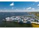 Aerial view of a large marina and waterfront buildings at 1650 W Marion Ave # 144, Punta Gorda, FL 33950