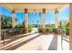 Covered porch with seating and a view of the street at 1650 W Marion Ave # 144, Punta Gorda, FL 33950