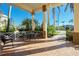 Spacious covered porch with patio furniture at 1650 W Marion Ave # 144, Punta Gorda, FL 33950