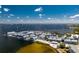Aerial view of marina, waterfront restaurants, and bridge at 1650 W Marion Ave # 144, Punta Gorda, FL 33950