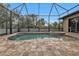 Screened pool and spa with paver deck at 19199 Roosevelt Ave, Port Charlotte, FL 33954