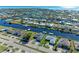Wide aerial view of canal front home and neighborhood at 21341 Edgewater Dr, Port Charlotte, FL 33952
