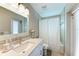 Clean bathroom with a single vanity, shower/tub combo, and updated fixtures at 21341 Edgewater Dr, Port Charlotte, FL 33952