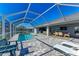 Stunning screened pool with canal views and patio furniture at 21341 Edgewater Dr, Port Charlotte, FL 33952