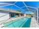 Relaxing screened pool and patio area at 21341 Edgewater Dr, Port Charlotte, FL 33952