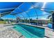 Inviting screened pool with canal views at 21341 Edgewater Dr, Port Charlotte, FL 33952