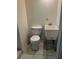 Small bathroom with toilet and utility sink at 2273 Ednor St, Port Charlotte, FL 33952