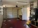 Garage with automatic door opener and storage shelves at 2273 Ednor St, Port Charlotte, FL 33952