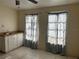 Small kitchenette with sink and cabinets at 2273 Ednor St, Port Charlotte, FL 33952