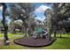 playground nestled among mature trees at 24092 Potosi Ct, Punta Gorda, FL 33955
