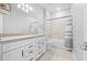 Clean bathroom with granite vanity and bathtub at 43015 Parkside Ct, Punta Gorda, FL 33982