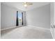 Well-lit bedroom with neutral walls and carpeted floors at 43015 Parkside Ct, Punta Gorda, FL 33982