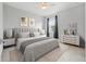 Comfortable bedroom with plush bed and ample natural light at 43015 Parkside Ct, Punta Gorda, FL 33982
